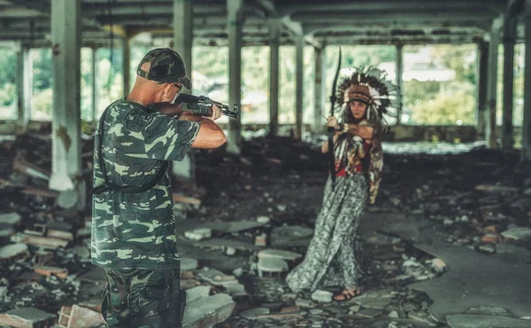Airsoft sfaceier and indian woman in the face industry building. — Photo