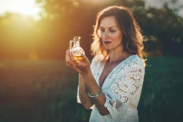 Woman Holding Bottle Oil Concept Alternative Medicine Herbs — 스톡 사진