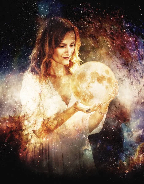 Woman holding a big glowing sphere moon in cosmic space