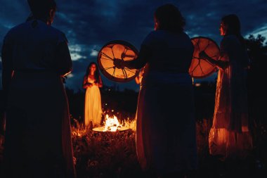 Women at the night ceremony. Ceremony space