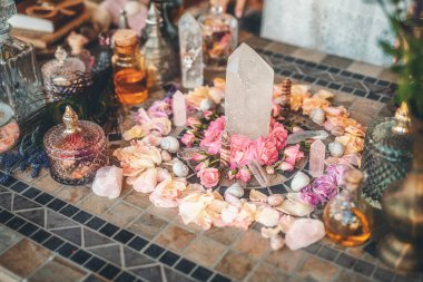 beautiful altar with crystals and rose flowers