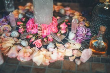 beautiful altar with crystals and rose flowers