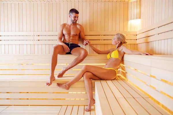 Happy Couple Swimwear Sitting Hot Sauna Holding Hands Couple Decided — стоковое фото