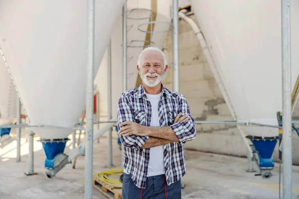 Happy Proud Senior Sugar Refinery Worker Standing Front Silos Arms — Stock Photo, Image