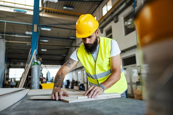 Bearded Tattooed Worker Protective Uniform Working Wooden Parts His Workshop — Foto Stock