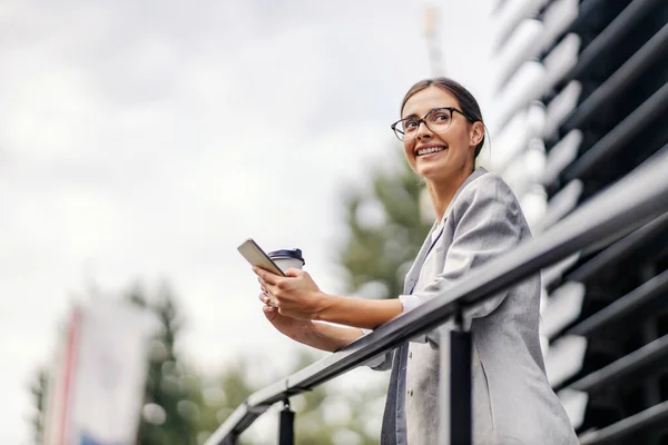 Happy Young Businesswoman Standing Outdoors Her Coffee Break Leaning Railing — Stock Photo, Image