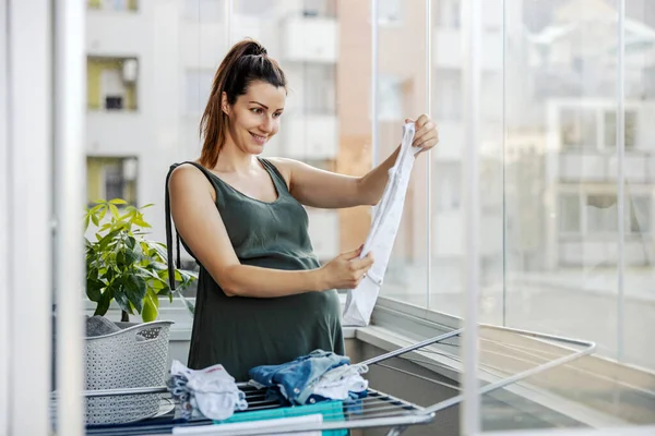 Excited Expectant Mother Prepares Clothes Newborn Pregnant Smiling Woman Stands — Stock Photo, Image