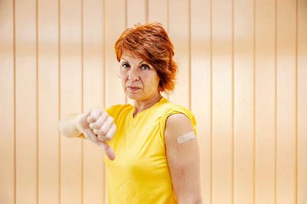 Serious Woman Showing Her Shoulder Vaccine Gesturing Thumbs Antivax Concept — Stock Photo, Image