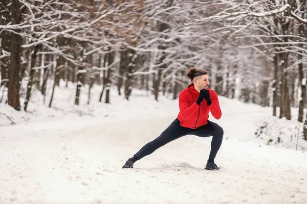 Sportsman Doing Stretching Warmup Exercises While Standing Snow Nature Winter — Stock Photo, Image