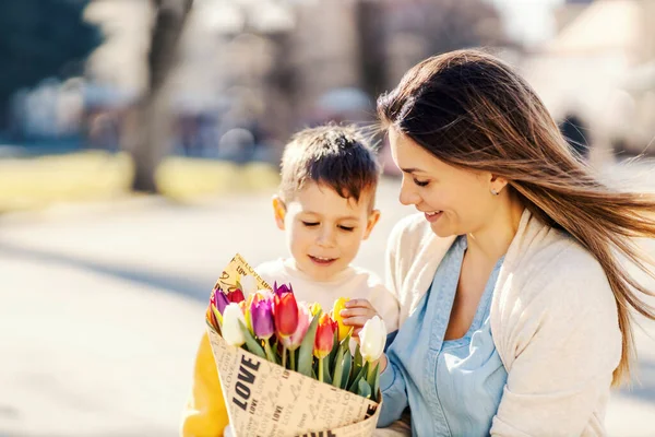 Little Boy Giving Present His Mom Mother Day — стоковое фото