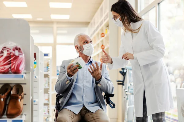 Senior Man Wheelchair Consulting Pharmacist Drugs — Stock Photo, Image