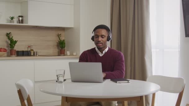 Young adult african american black male working from home call center employee — Stock Video