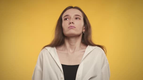 Woman Taking Deep Breath Exhale Bright Yellow Background Slow Motion — Vídeo de stock