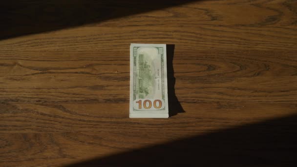 Top View Caucasian Woman Hands Entering Frame 100 Dollar Bill — Video