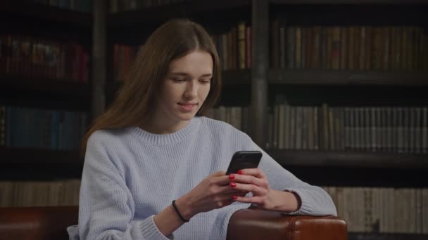 Close Caucasian Woman Texting Flirting Her Smart Phone Indoors Slow — Video