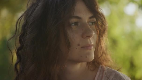 Close Portrait Young Adult Curly Caucasian Woman Freckles Looking Sunlight — Stock Video