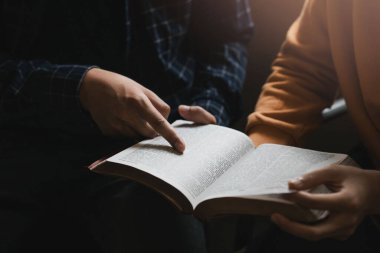 two lovers studying the bible It is God's love for Christians.