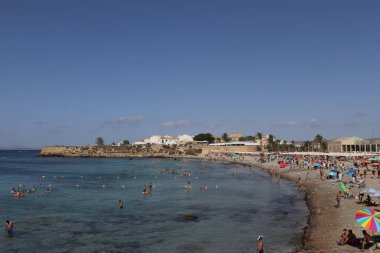 Alicante, Spain Agost 26, 2020t A View of the beach in Tabarca Island. People are enjoying beautiful blue mediterranean sea in a sunny day