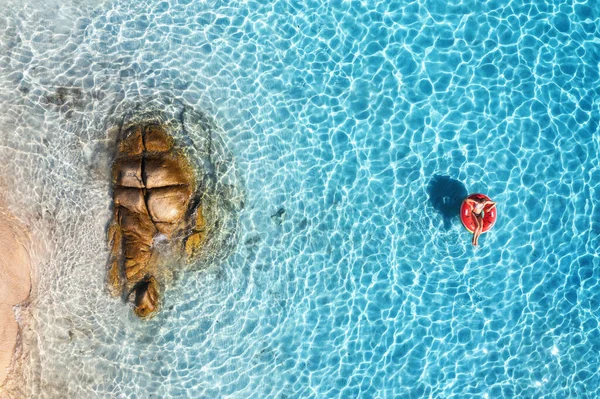 Aerial View Young Woman Swimming Red Swim Ring Blue Sea — Stockfoto