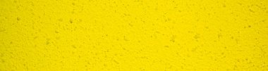 Açık sarı beton doku. Duvardaki desen. Siyah noktalı sarı alçı. Alanı yerleştirmek için pankart
