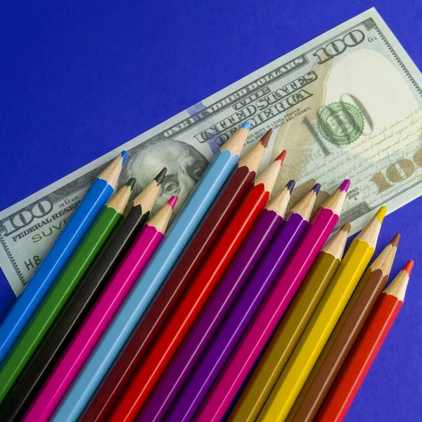 Multicolored Pencils Souvenir Dollar Bills Items Lie Blue Background Square — Stock Photo, Image