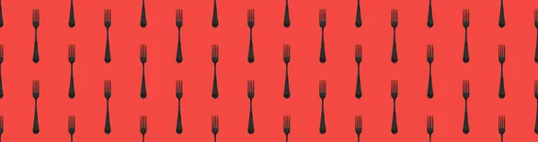Seamless pattern. Fork top view on red background. Template for applying to surface. Banner for insertion into site. Place for text cope space. Flat lay. 3D image. 3D rendering.