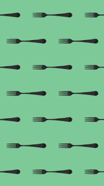 Desen. Pastel yeşil arkaplanda çatal üst görünümü. Yüzeye başvurmak için şablon. Dikey görüntü. Düz yatıyordu. 3 boyutlu görüntü. 3B görüntüleme.