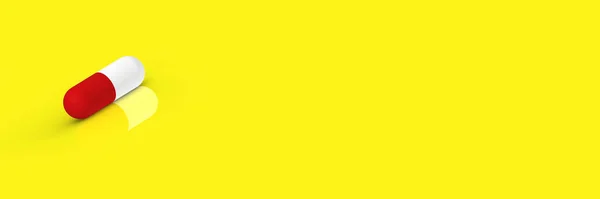 Czerwona Kapsułka Leży Żółtym Tle Odbiciem Leki Poziomy Obraz Baner — Zdjęcie stockowe