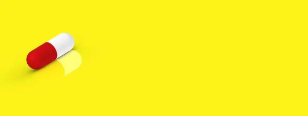 Eine Rote Kapsel Liegt Auf Gelbem Hintergrund Mit Reflexion Medikamente — Stockfoto