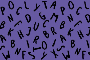 template with the image of keyboard symbols. set of letters. Surface template. Fiolet background. Horizontal image.