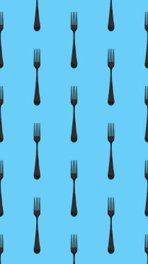Desen. Pastel mavi arkaplanda çatal üst görünümü. Yüzeye başvurmak için şablon. Dikey görüntü. Düz yatıyordu. 3 boyutlu görüntü. 3B görüntüleme.