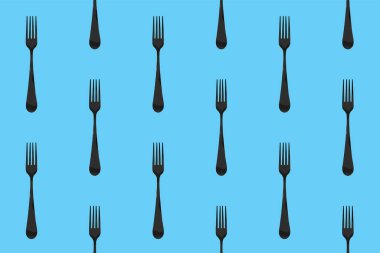 Desen. Pastel mavi arkaplanda çatal üst görünümü. Yüzeye başvurmak için şablon. Yatay görüntü. Düz yatıyordu. 3 boyutlu görüntü. 3B görüntüleme.