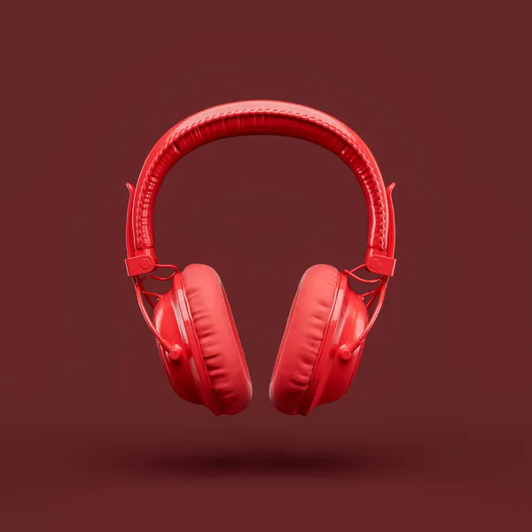 单色单色红色在一个红色工作室的耳机上 前视图 3D渲染 — 图库照片