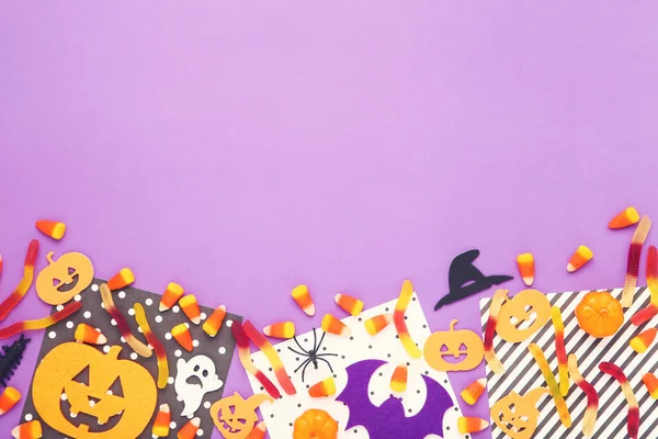 Halloween Candies Paper Pumpkins Ghost Spider Purple Background — Stock Photo, Image