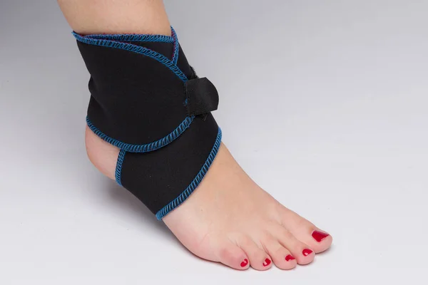 Close Female Foot Supporting Bandage — Stock Photo, Image