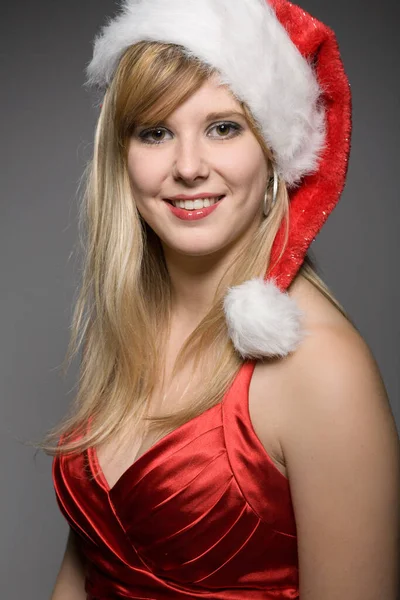 Pretty Christmas Girl Santa Claus Hat Front Grey Background — Stock Photo, Image