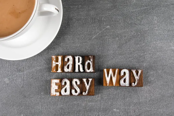 Hard or Easy Way concept. Cup of coffee on a chalk board — Stock Photo, Image