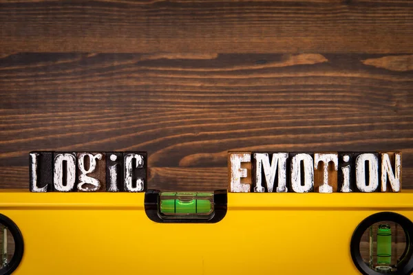 Logic and Emotion balance concept. Alphabet blocks on a wooden background — Foto Stock