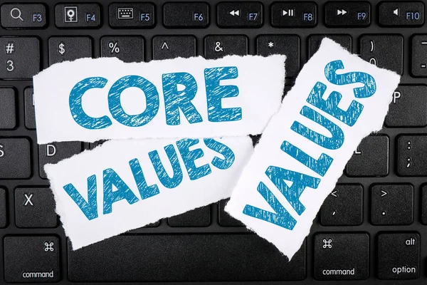 Core Values. Torn sheets of paper on a black computer keyboard — Stock Photo, Image