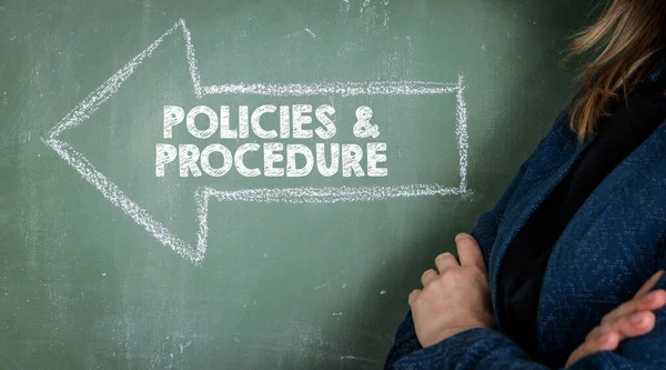 Policies and Procedure concept. Business woman, background of green chalk board — Stock Photo, Image