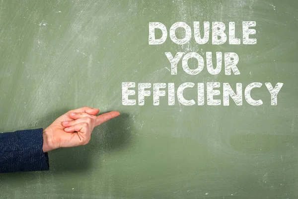 Double Your Efficiency. Text on a green chalkboard background — Stock Photo, Image