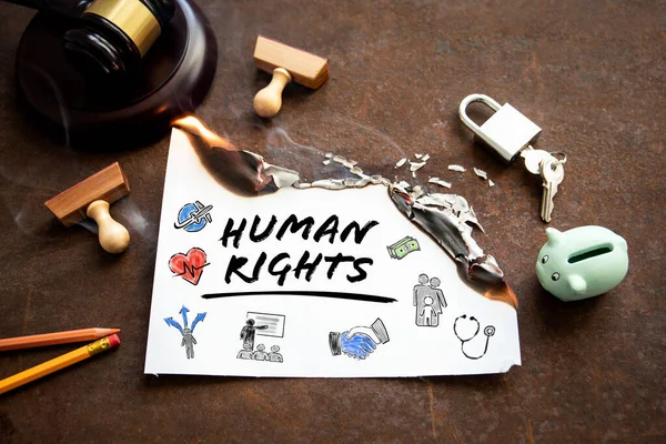 HUMAN RIGHTS. Judges hammer and office supplies on a rusty metal background — 스톡 사진