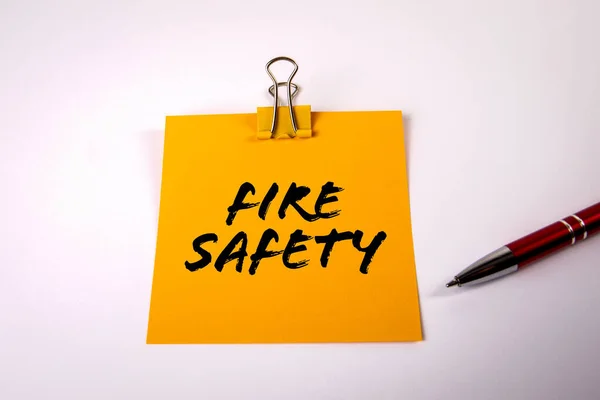 Fire Safety. Sheet of paper and pen on a white background — Stok fotoğraf