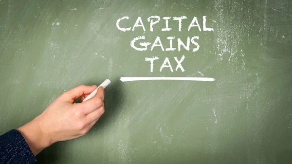 Capital Gains Tax Texto Sobre Quadro Verde — Fotografia de Stock