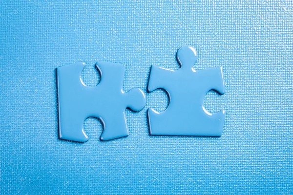 Blue Puzzle Pieces Blue Textured Background — Stok fotoğraf