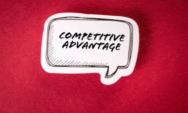 COMPETITIVE ADVANTAGE. Speech bubble with text on red background.