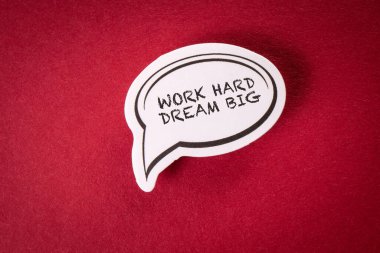 Work Hard Dream Big. Text on speech bubble. Red background.