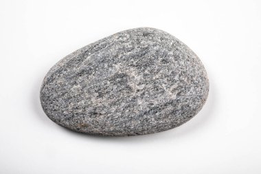 Gray, oval stone on a white background.