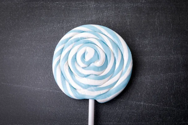 Blue Candy Stick Lollipop Dark Chalkboard Background — Stock Photo, Image