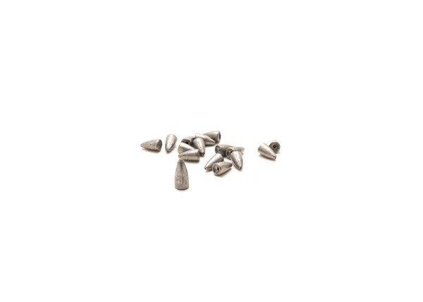 Montón de pesos de bala de plomo con bases cóncavas para caber narices de gusano aisladas en blanco — Foto de Stock